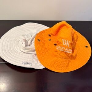 Two toddler sun hats orange and white
